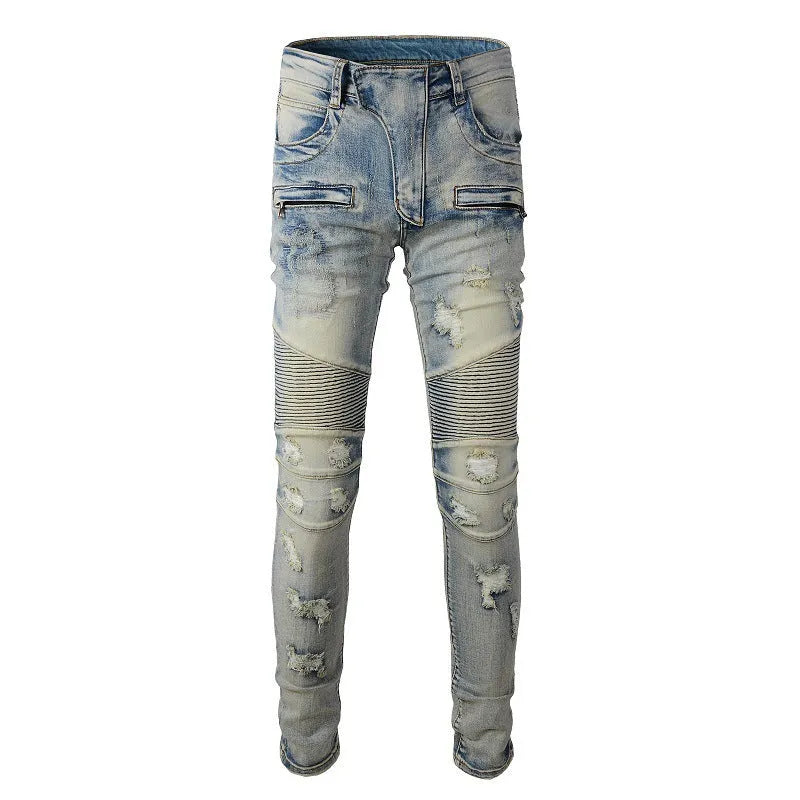 Men's light blue distressed slim fit jeans with hand-frayed details and straight leg opening