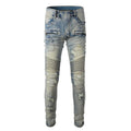 Men's light blue distressed slim fit jeans with hand-frayed details and straight leg opening