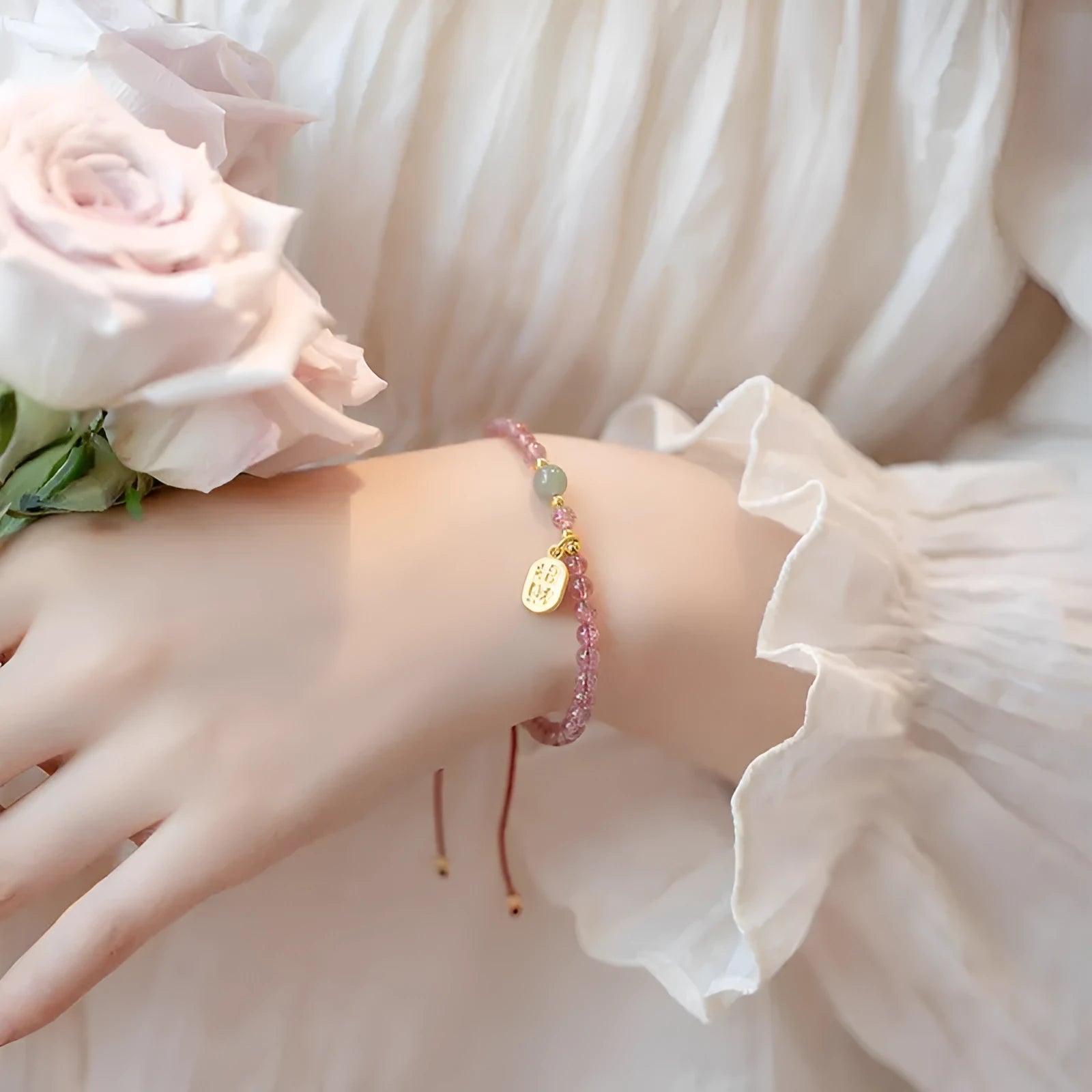 Red rope bracelet with strawberry quartz crystal and hand-woven construction for women