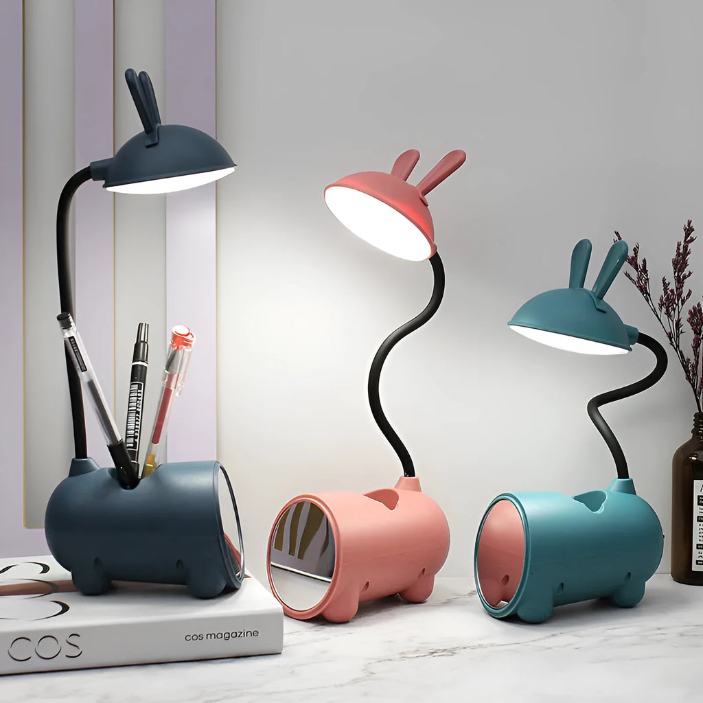 Cartoon style USB-powered desk lamp with pen storage compartment in dark blue colour