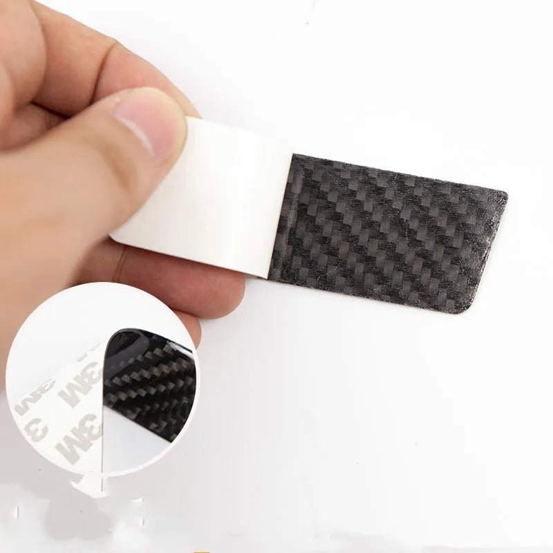 Carbon fibre door handle protection patches for Tesla Model S interior