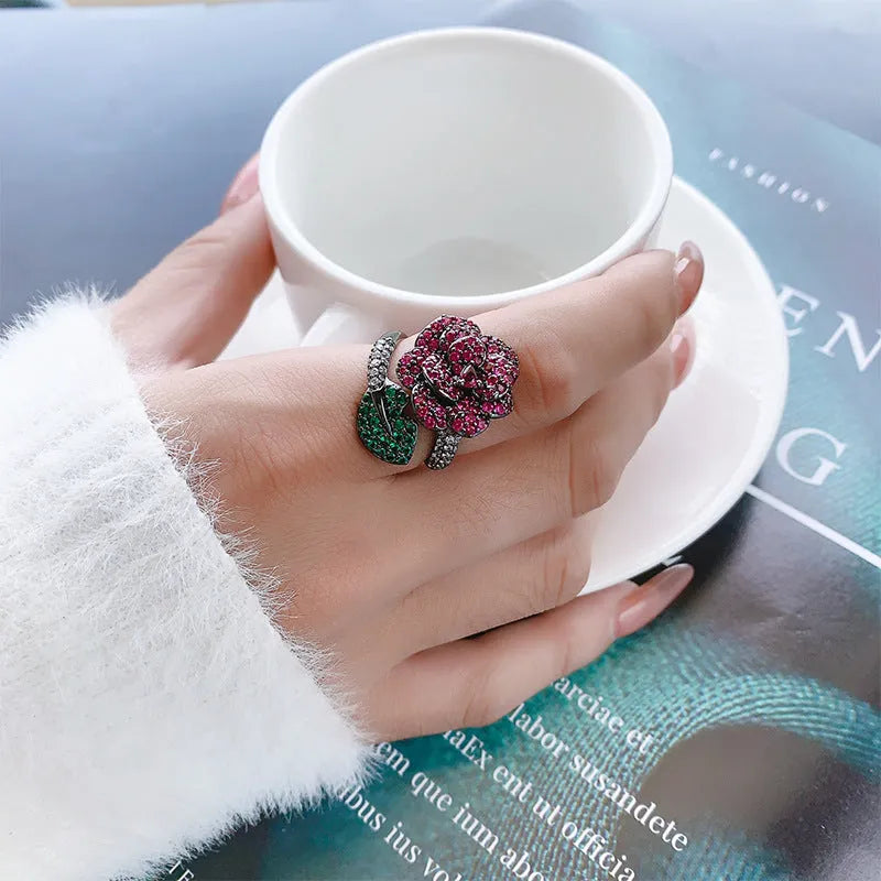 Geometric black gold ring with gold-plated red corundum centrepiece for women