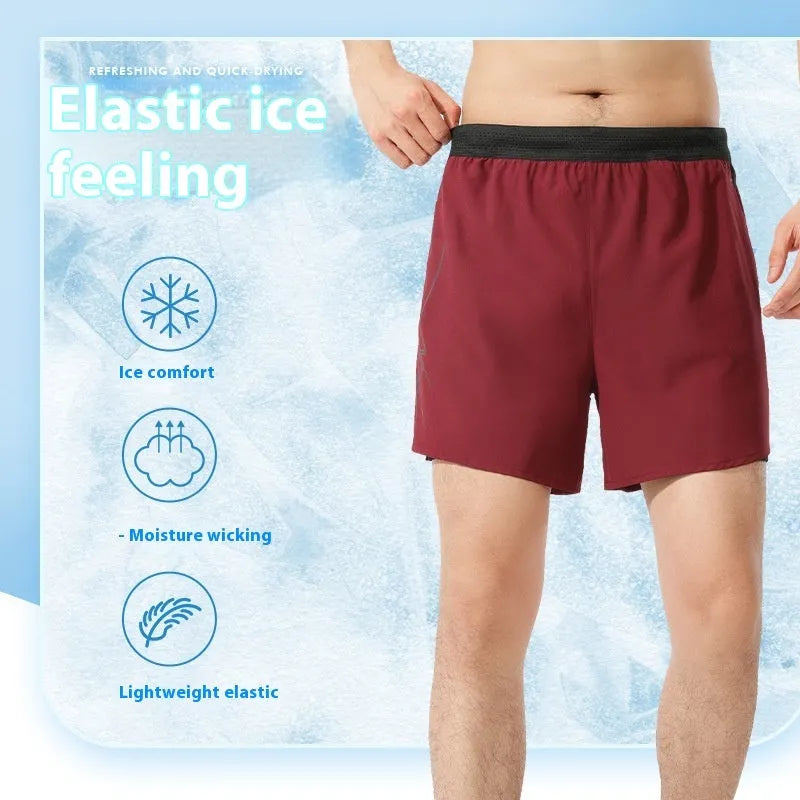Men's solid-colour low-waist basketball shorts in polyester fabric