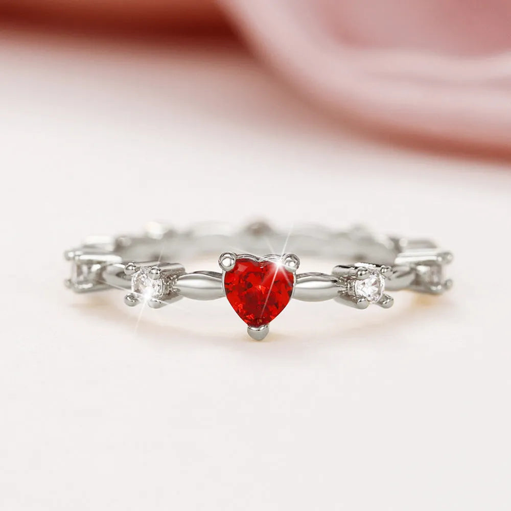 Geometric peach heart ring with zircon detail in gold or silver electroplated finish