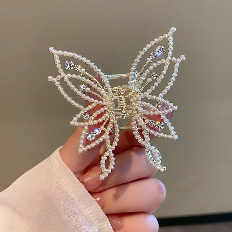 Butterfly-shaped alloy hair clip with rhinestone or pearl decorations, 6.7 cm wide