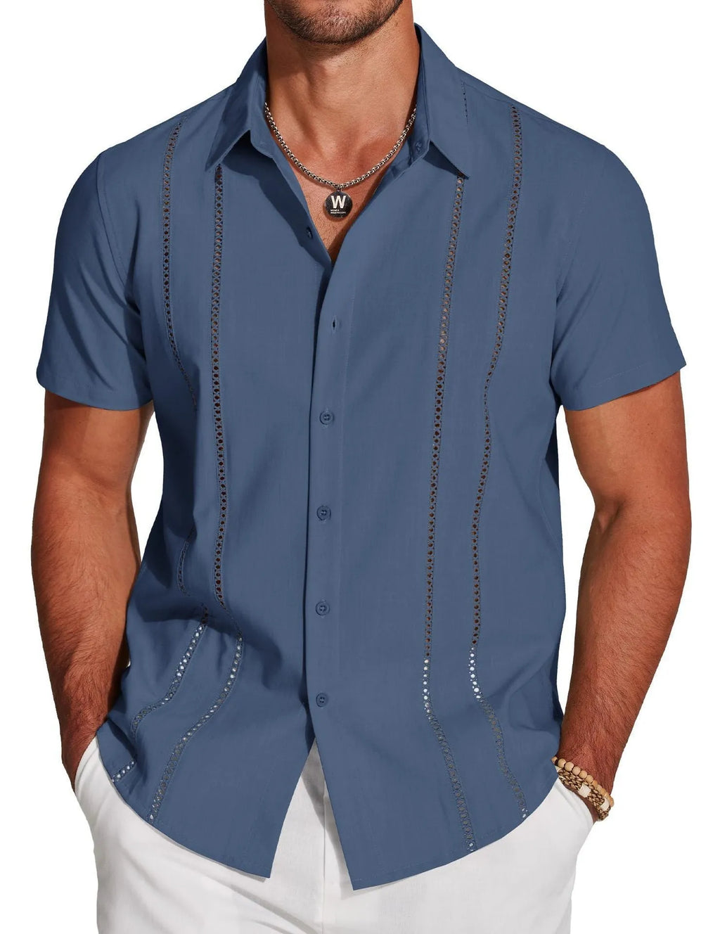 Man wearing a slim fit, short sleeve Hawaiian shirt with a digital print pattern.