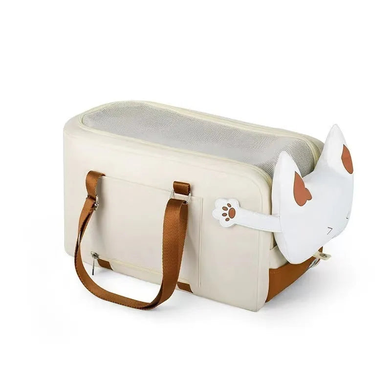 Beige hard-shell pet flight case with one-shoulder strap for cats and small dogs