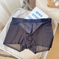 Men's thin breathable boxer shorts in rock ash colour with seamless construction and mid waist design