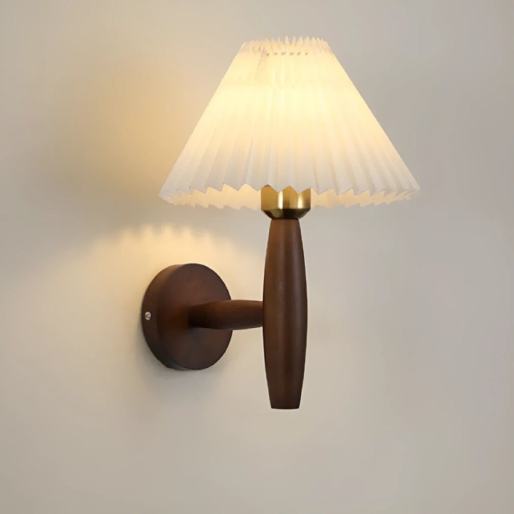 American retro wall lamp with a walnut wood base and white fabric shade mounted on a wall.