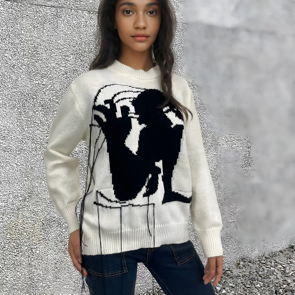 Women's grey alpaca wool pullover sweater with tassel detailing and abstract pattern