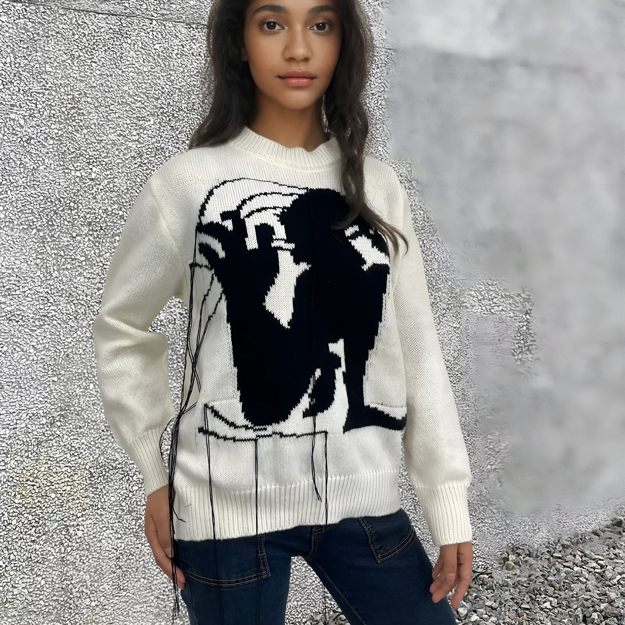 Women's grey alpaca wool pullover sweater with tassel detailing and abstract pattern