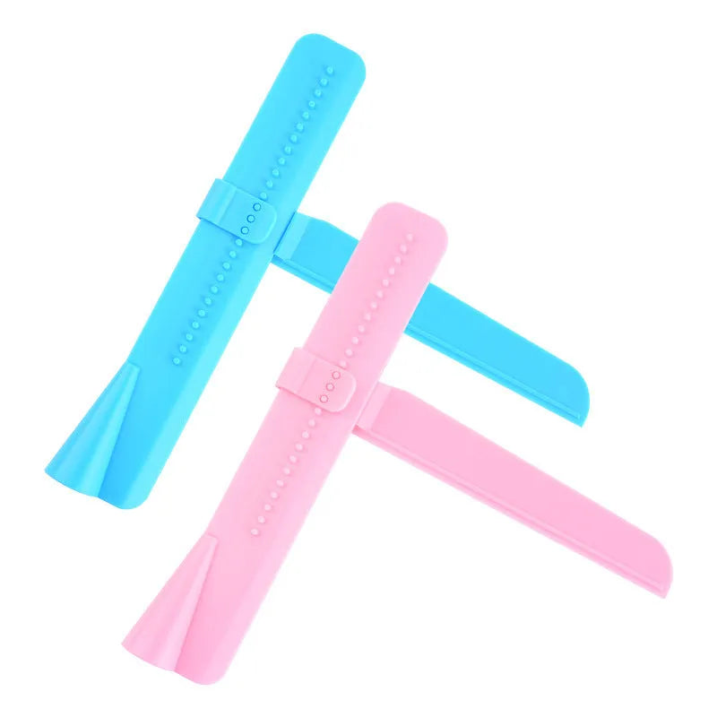 Blue ABS plastic cake smoother for cream scraping and smearing on a plain background