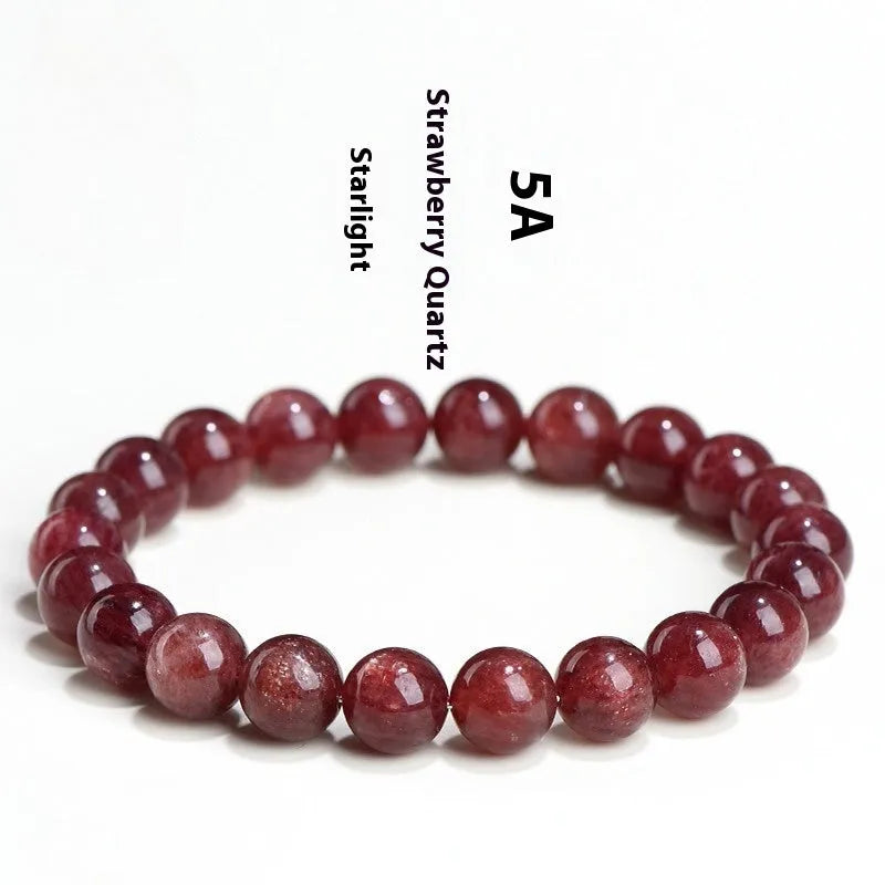 Natural cherry red strawberry quartz bracelet with geometric cut stones on wrist