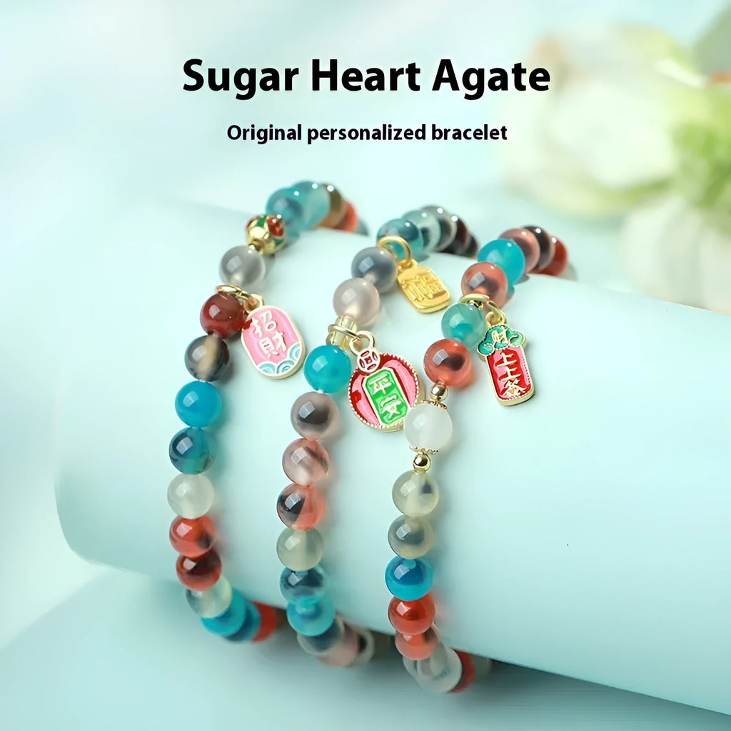 Women's agate bracelet with natural colourful sugar heart design and copper coin snake detailing