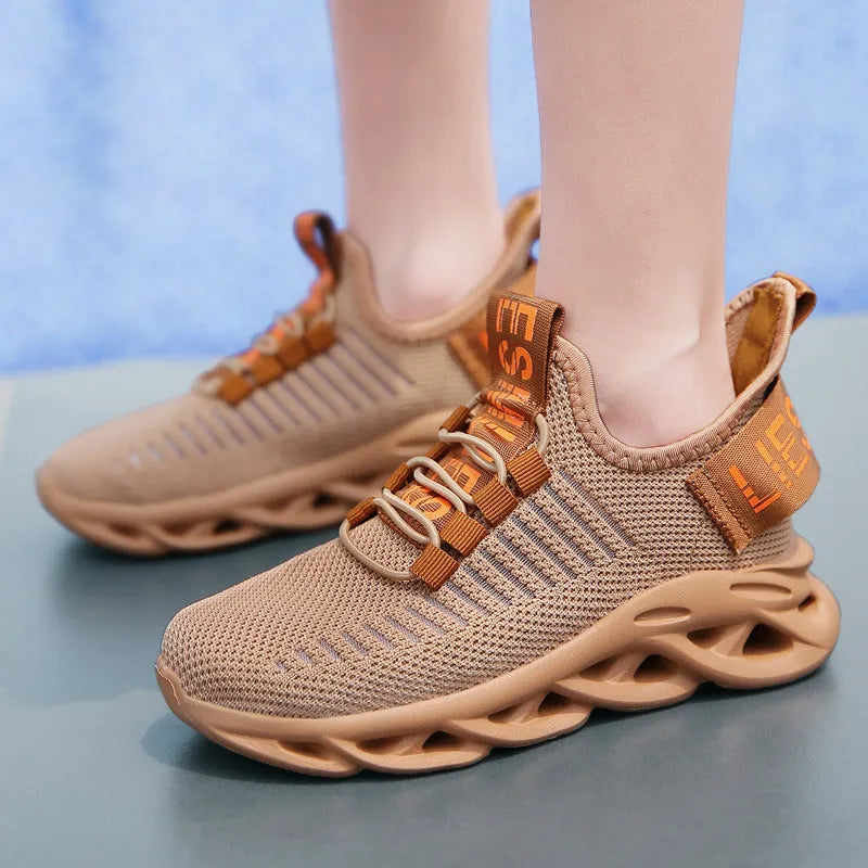 Children's black waterproof sneakers with Velcro closure and breathable fabric upper