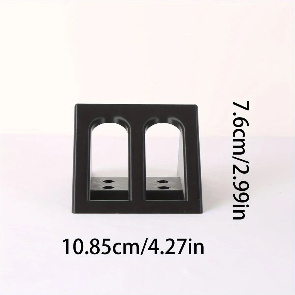 Black plastic pistol display stand for model firearms measuring 10.85 by 7.6 centimetres