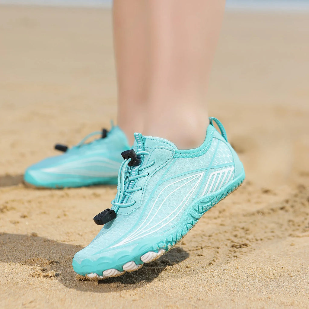 Children's black quick-drying wading shoes with non-slip rubber sole and elastic band.