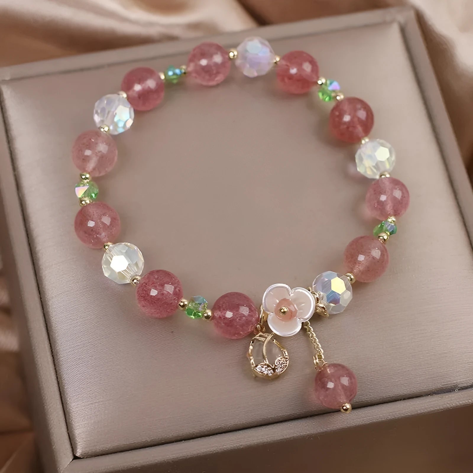 Women's double layer crystal bracelet with lucky cat charm and red cat's eye flowers design.