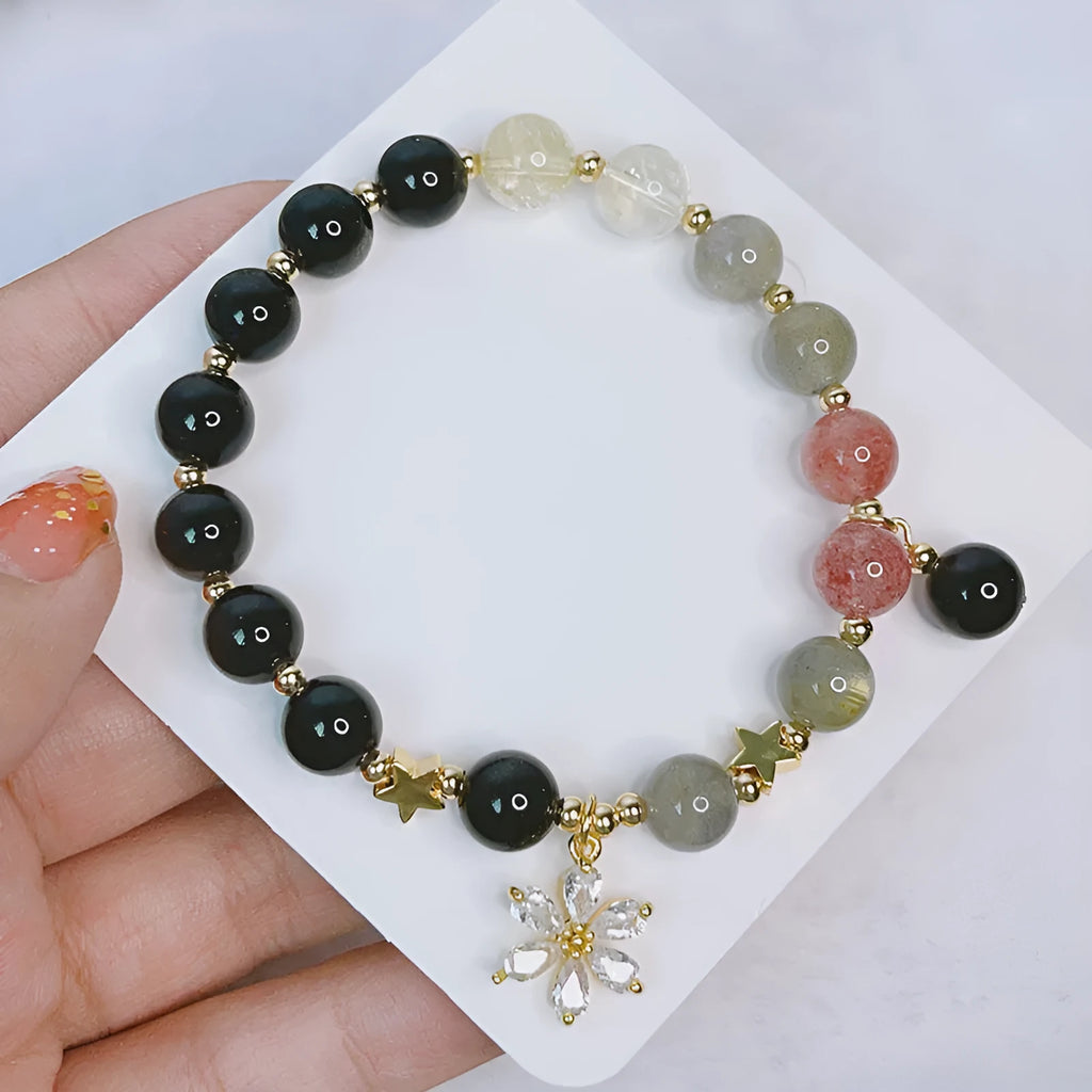 Silverstone electroplated women's bracelet with adjustable clasp and choice of floral, heart, or star charm designs
