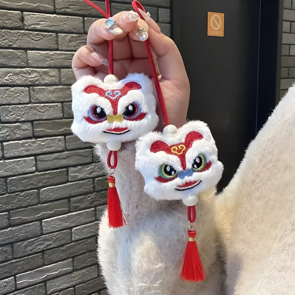 Blue Chinese style plush lion keychain ornament with tassels and star stone detail