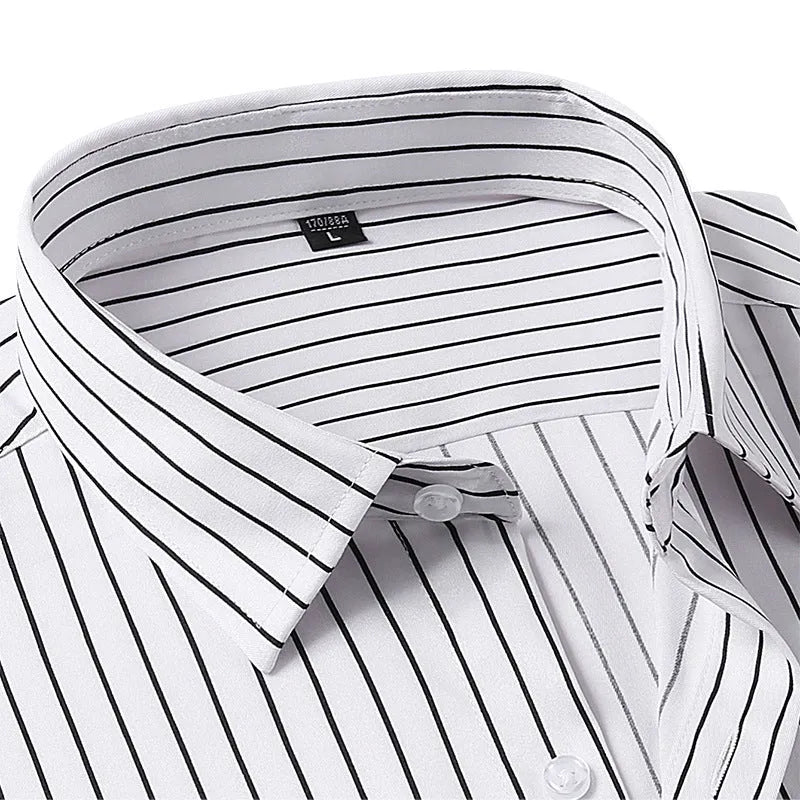 Man wearing a slim fit blue and white striped long sleeve business shirt.