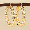 Geometric ring and line design drop-shaped clip-on earrings for women in copper with electroplated finish.
