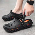Men's beige ventilated EVA slipper sandals with hollow out design and round toe on a plain background.