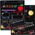 White modern wooden first day of school blackboard sign on a table.
