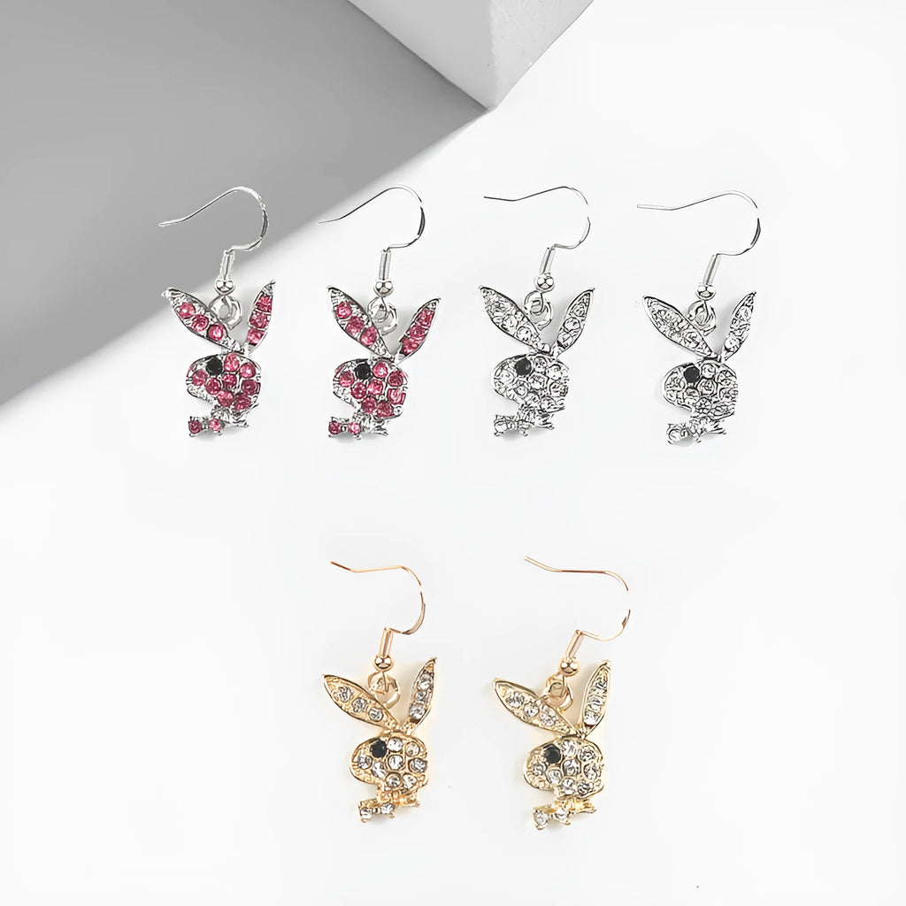 A pair of full diamond rabbit stud earrings in alloy metal, shown in silver, pink, and gold colour options.