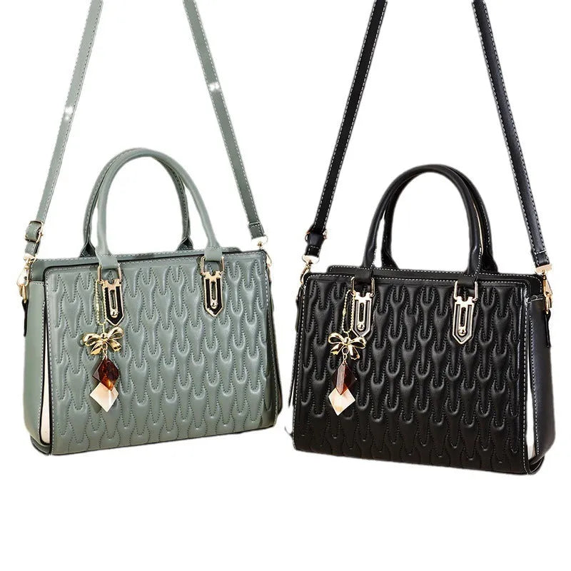 Women's black large-capacity shoulder messenger bag with an external sandwich pocket.