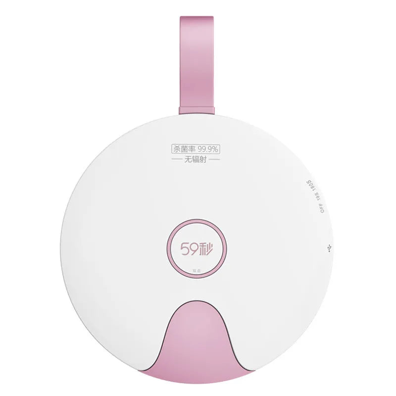 A slim, portable baby bottle sterilizer in blue or pink, showing USB port and compact design.