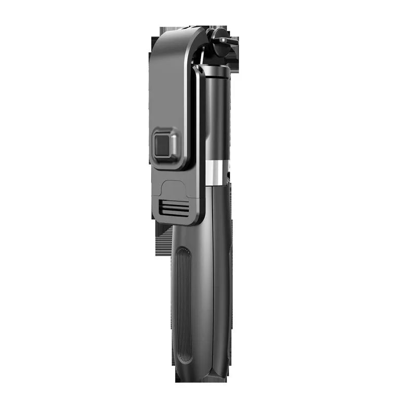 Black extendable Bluetooth selfie stick tripod with wireless remote next to a smartphone