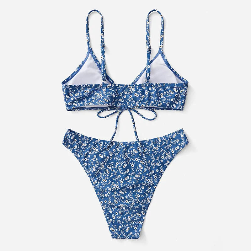 Blue polyester swimsuit three-piece set without steel rings showing separate top and shorts components