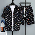 Men's casual polyester shorts two-piece set in a solid colour, showing short sleeve top and matching shorts.