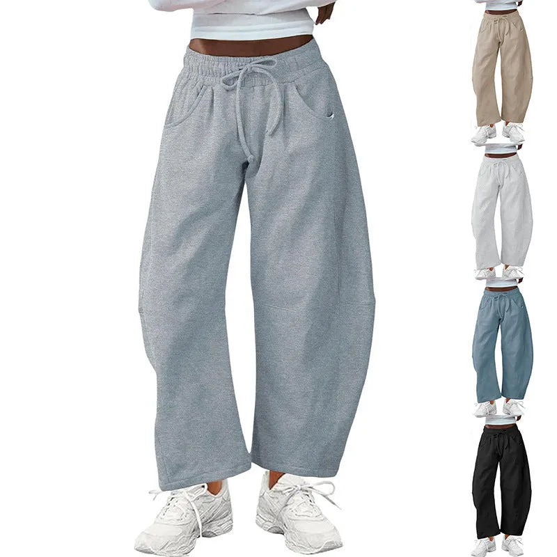 Loose cropped cotton sweatpants with elastic waist and pockets in multiple colour options