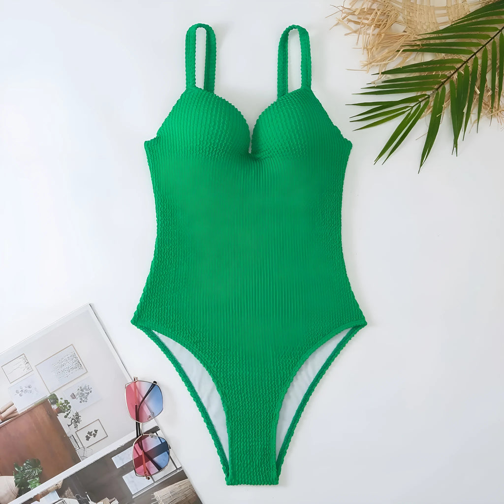 Women's black sleeveless one-piece swimsuit with a sunkissed stripe pattern on a mannequin.