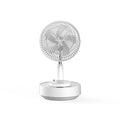 Green telescopic rechargeable electric fan showing extended floor-standing position with remote control