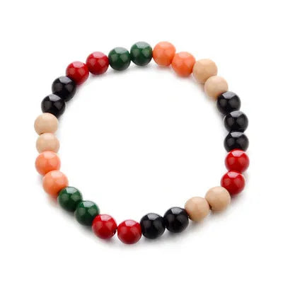 Natural stone bead bracelet with ethnic styling and lava stone components for essential oils
