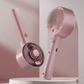 Ceramic White pet grooming brush with UVC light, mist spray nozzle, and soft needle head for dogs and cats.