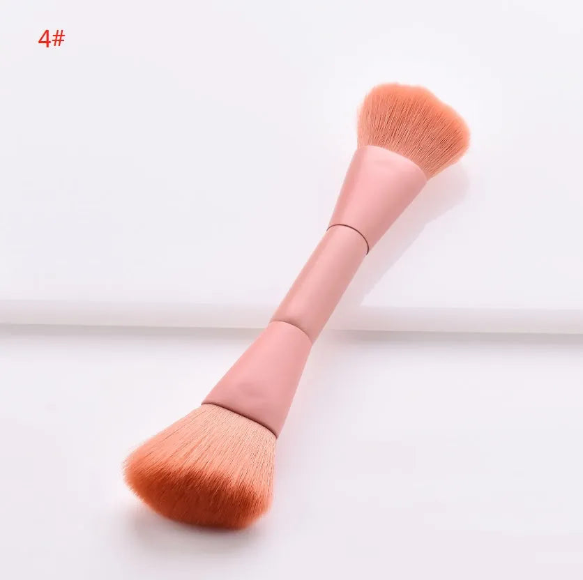 Ten professional makeup brushes with wooden handles in a pink box, including powder, foundation, and double-ended brushes.