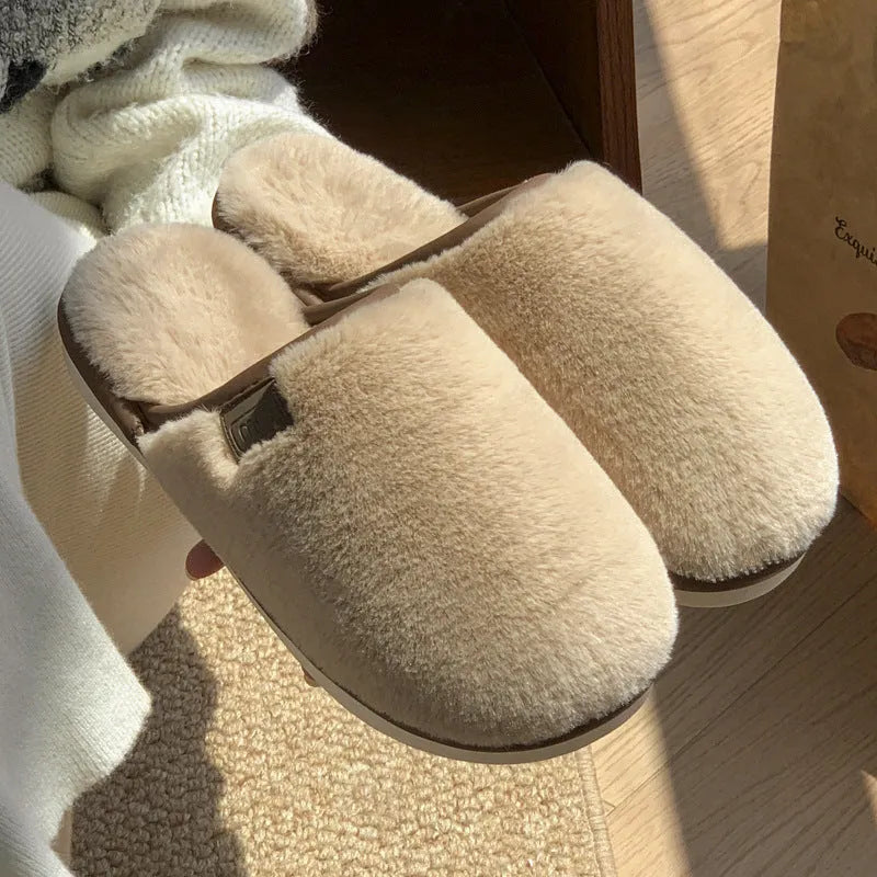 PVC plush winter slippers in a solid colour with a non-slip sole for indoor wear.