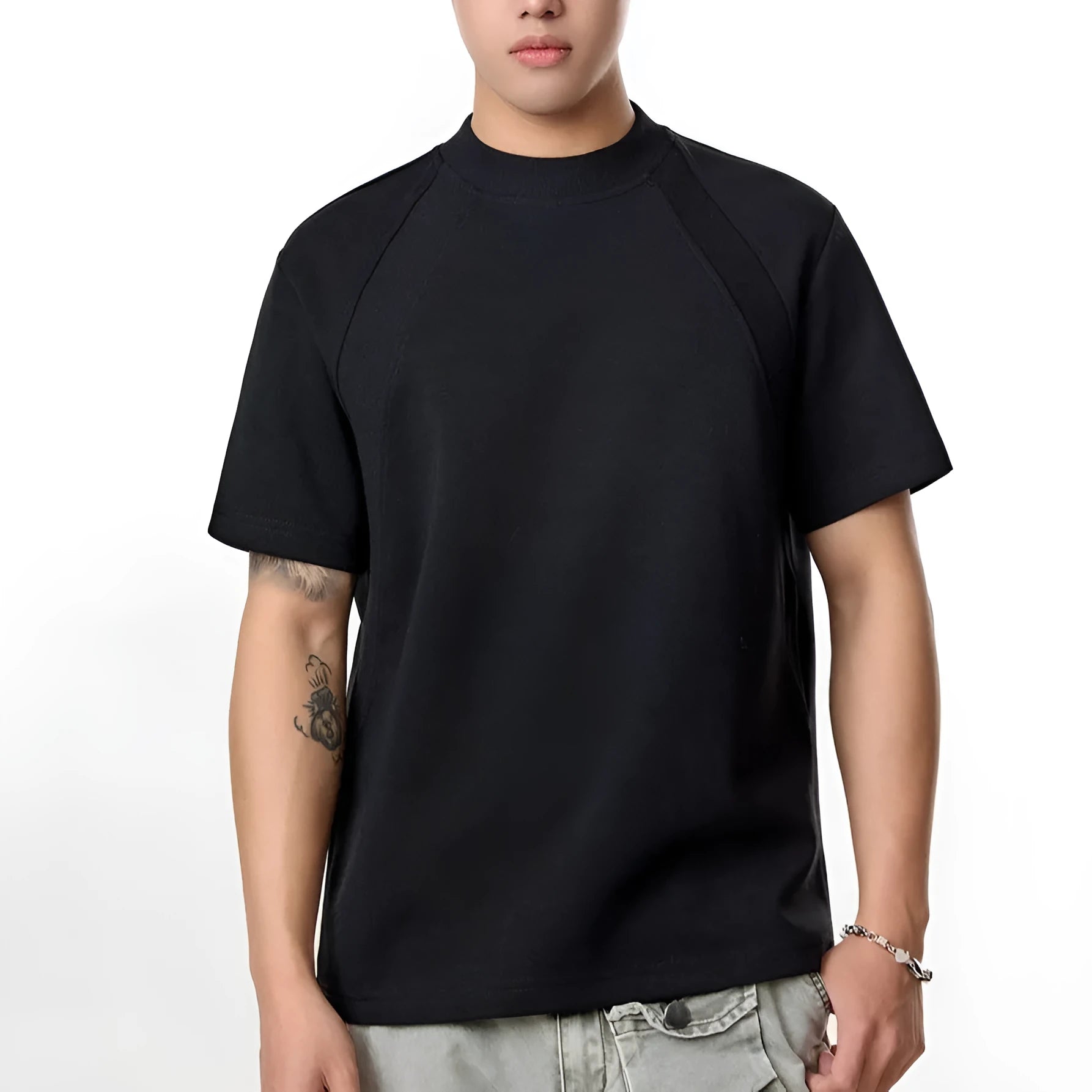Loose fit short sleeve top with air layer stitching detail in black, grey, or white.
