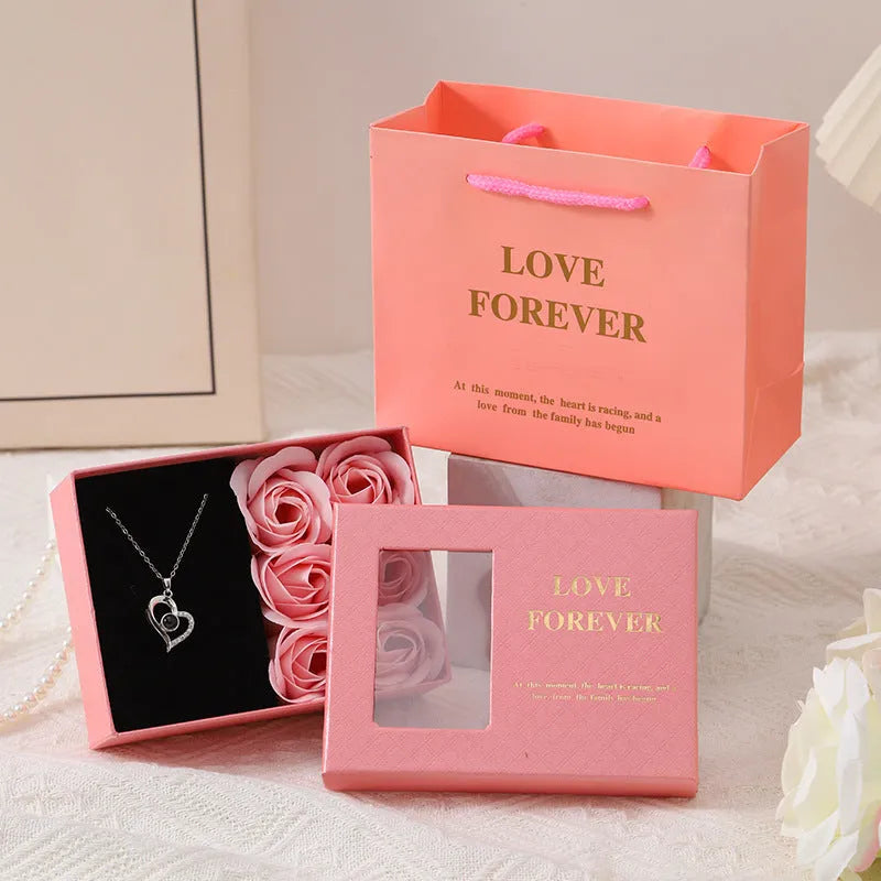 Korean style red soap flower gift set in box with handbag, six sculpted flowers inside.