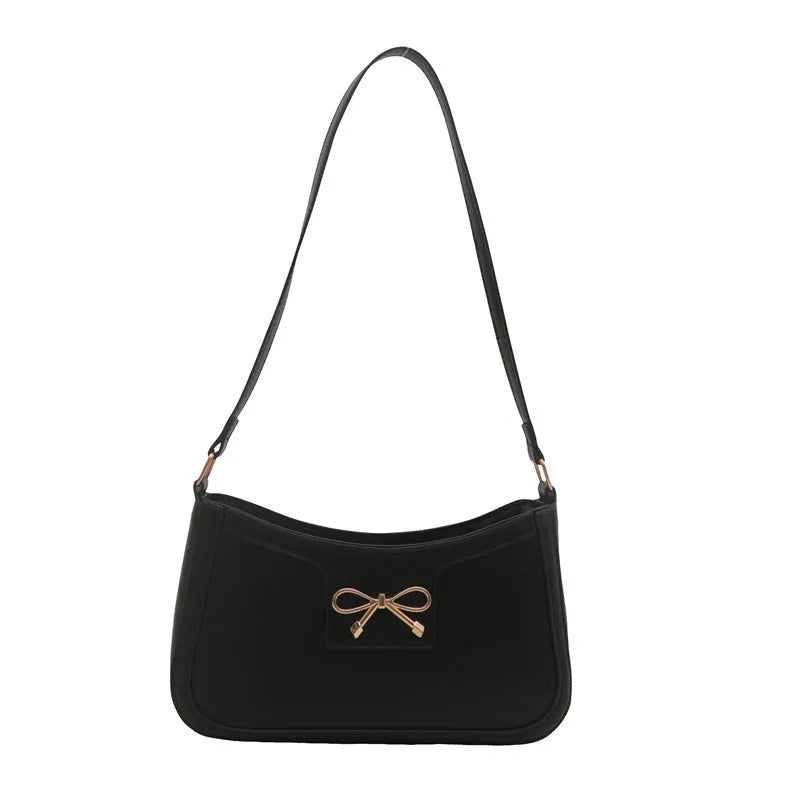 PU leather shoulder bag with bow detail in horizontal square shape showing rose red colour option