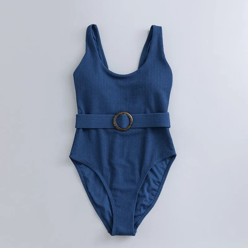 Navy blue women's one-piece slimming triangle swimsuit with chest pads on mannequin