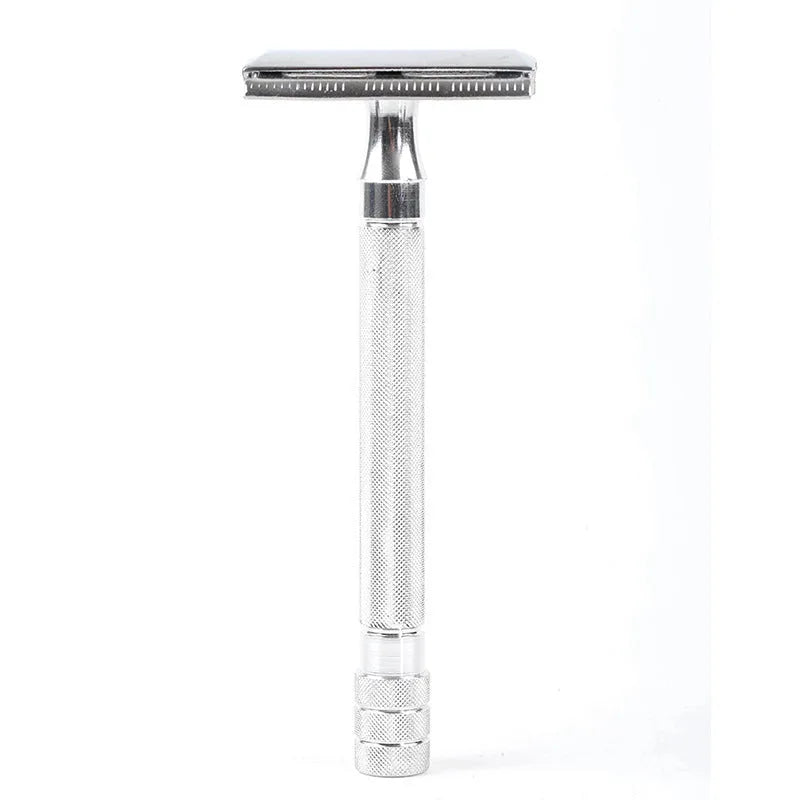 Traditional manual shaving razor with brush set on a black or silver handle