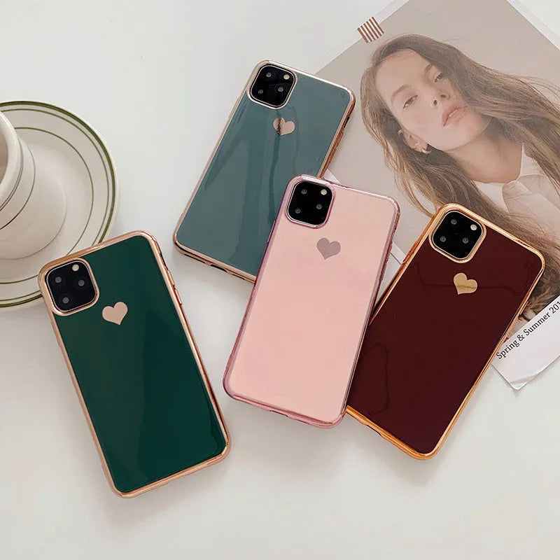 Solid colour TPU smartphone back cover case for iPhone models on a plain background.