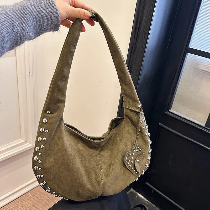 Soft plush underarm tote handbag in retro style showing black colour variant
