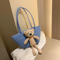 Woven cotton linen dumpling-shaped bag with three-dimensional pocket in khaki colour