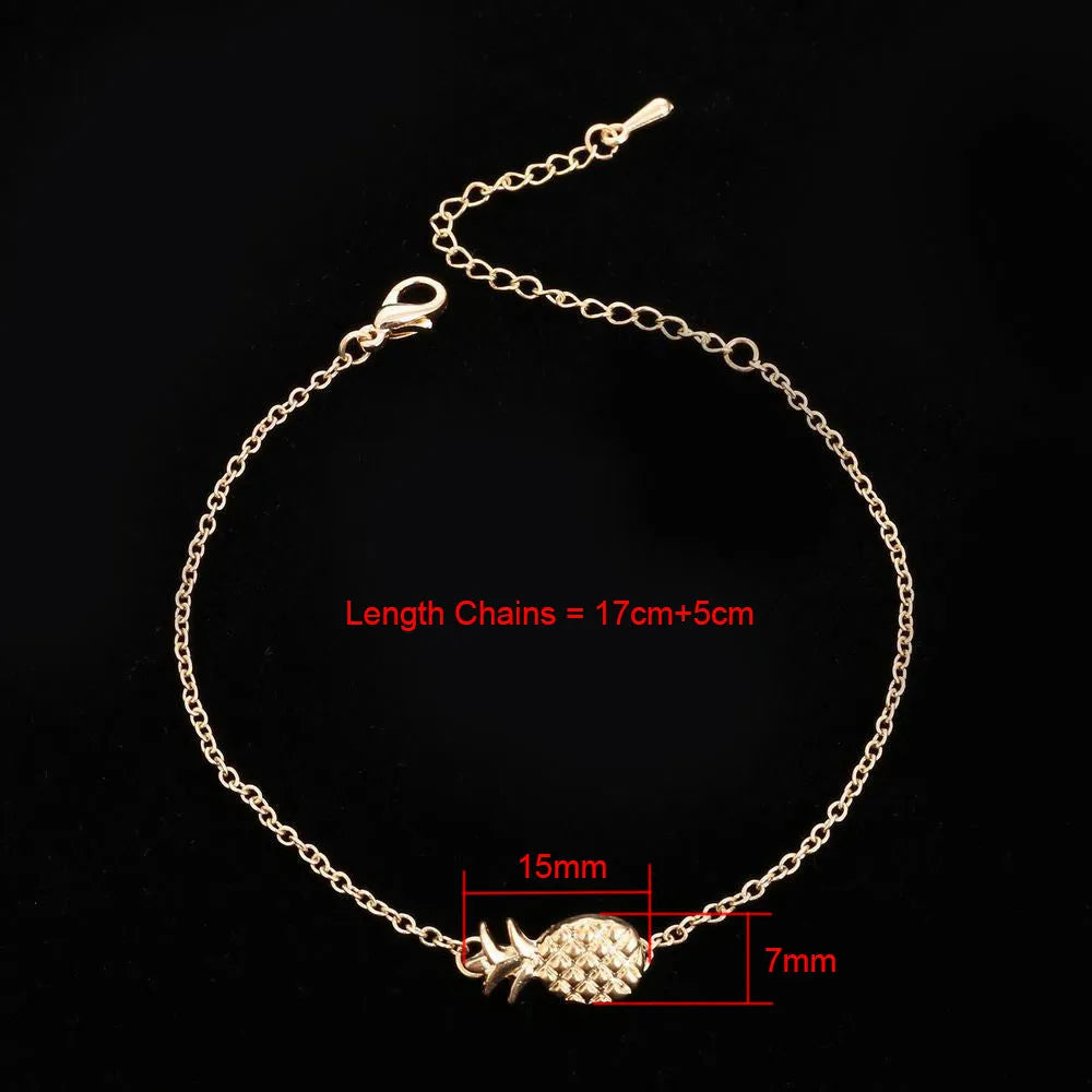Women's alloy bracelet with a detailed pineapple charm in gold or silver tone.
